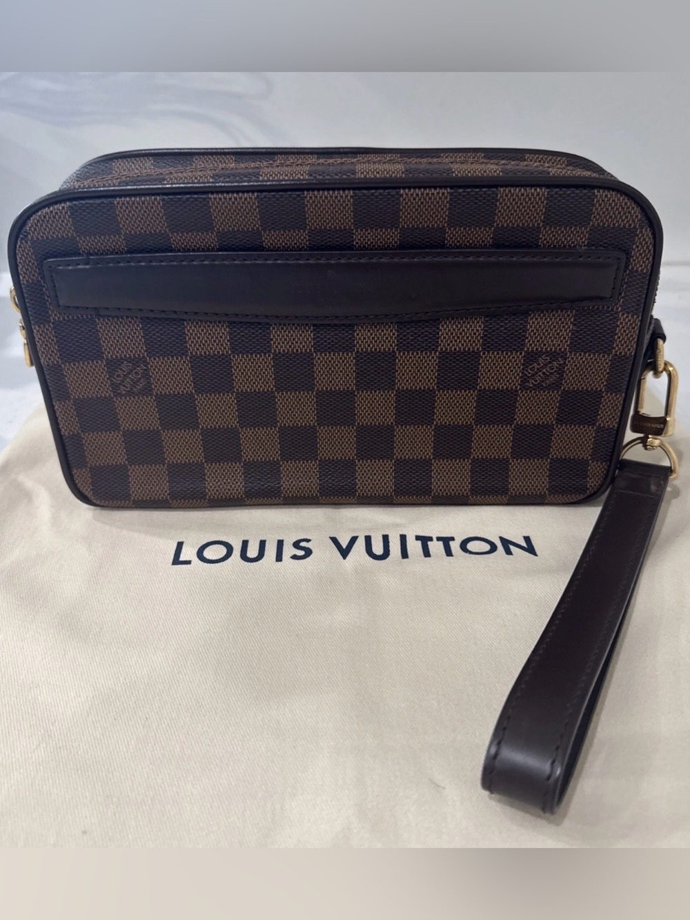 Louis Vuitton Damier Ebene Clutch in Brown